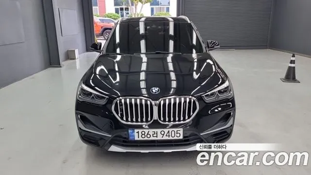 BMW X1 2021 — photo 1