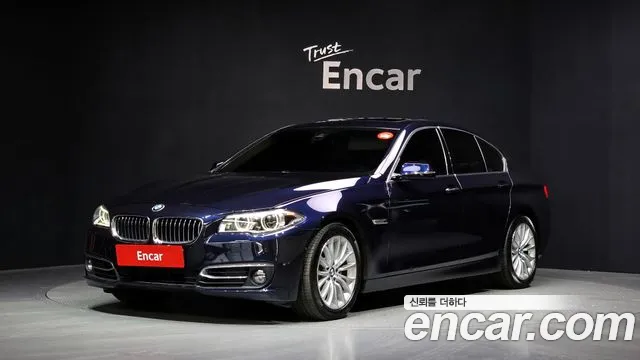 BMW 5-Series 2014 — photo 1