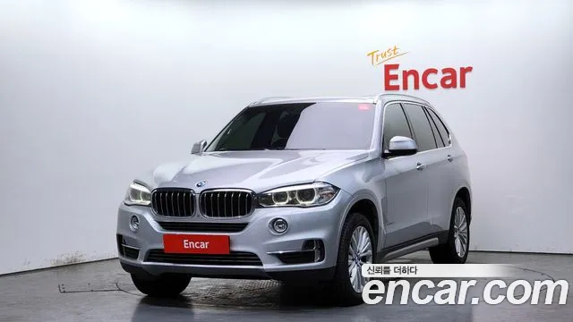 BMW X5 2014 — photo 1