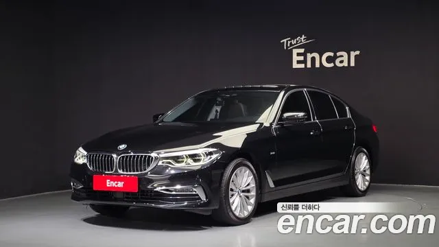 BMW 5-Series 2018 — photo 1