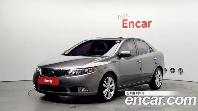Kia Porte 2011 — photo 1