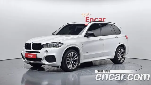 BMW X5 2015 — photo 1