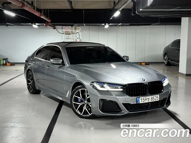 BMW 5-Series 2023 — photo 1