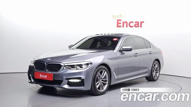 BMW 5-Series 2018 — photo 1
