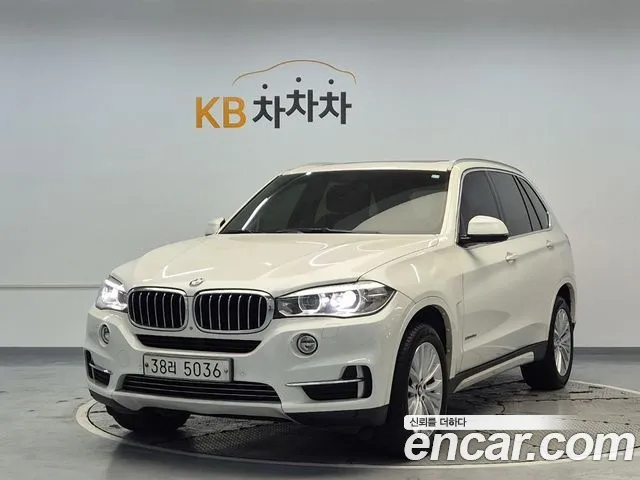 BMW X5 2014 — photo 1