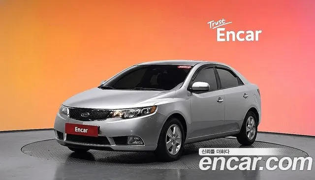 Kia Porte 2012 — photo 1