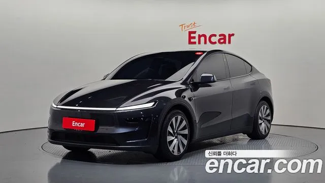 Tesla Model Y 2025 — photo 1
