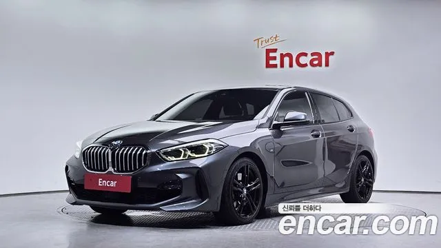 BMW 1-Series 2021 — photo 1