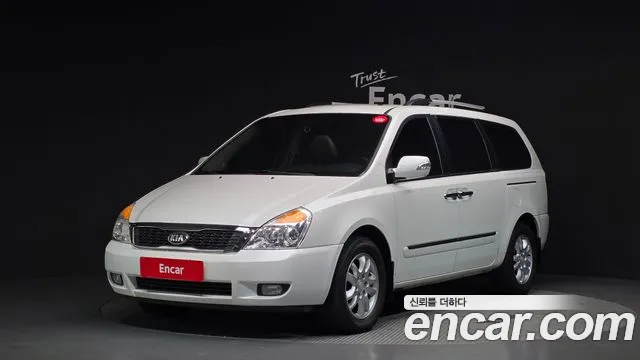 Kia Canival 2013 — photo 1
