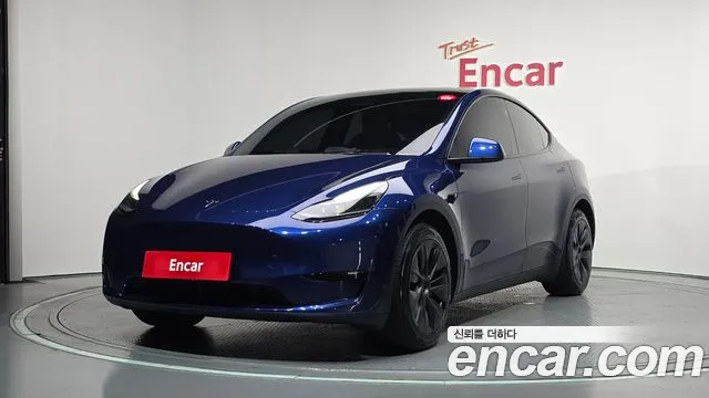Tesla Model Y 2025 — photo 1