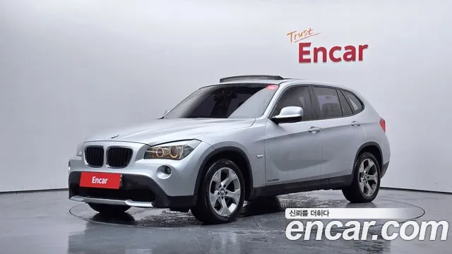 BMW X1 2010 — photo 1