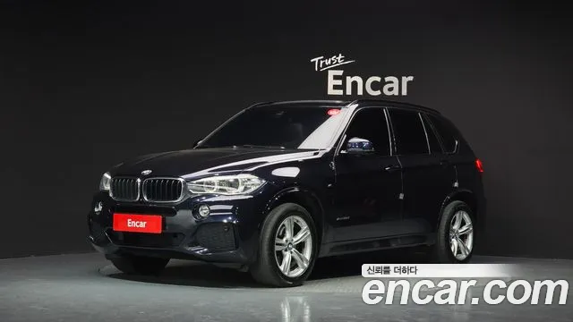 BMW X5 2018 — photo 1