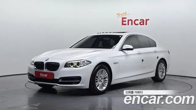 BMW 5-Series 2014 — photo 1