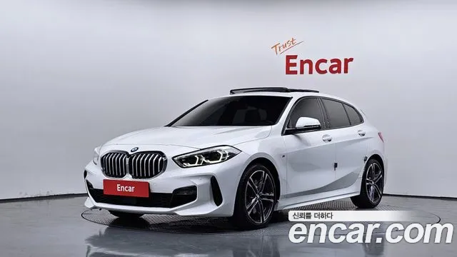 BMW 1-Series 2023 — photo 1