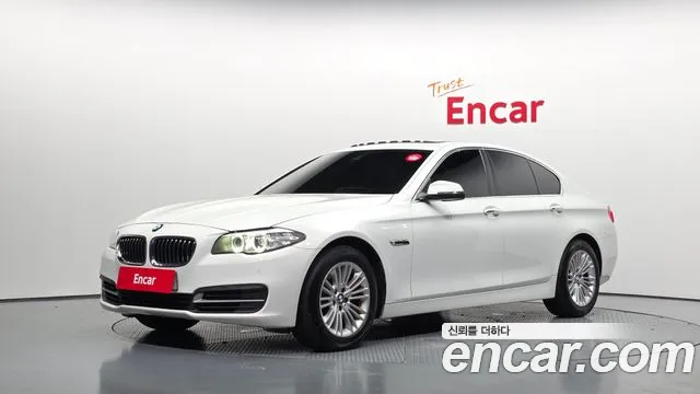 BMW 5-Series 2014 — photo 1