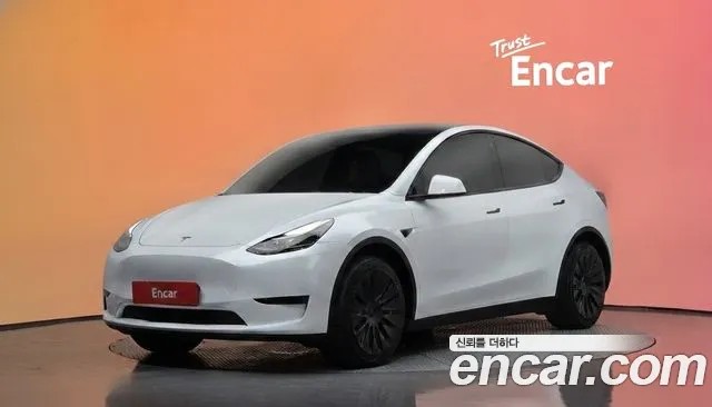 Tesla Model Y 2024 — photo 1