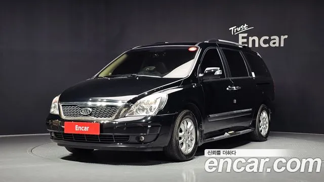Kia Canival 2012 — photo 1