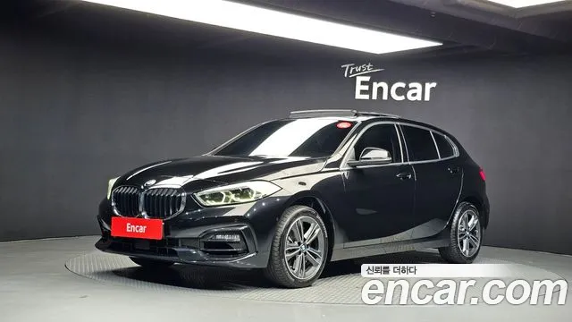 BMW 1-Series 2023 — photo 1