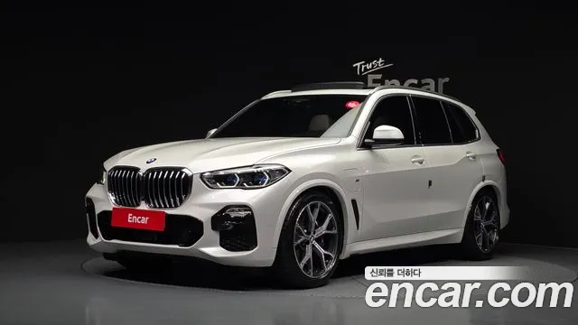 BMW X5 2021 — photo 1