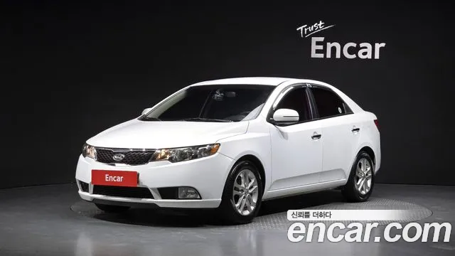 Kia Porte 2012 — photo 1