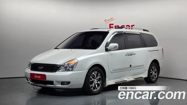 Kia Canival 2013 — photo 1