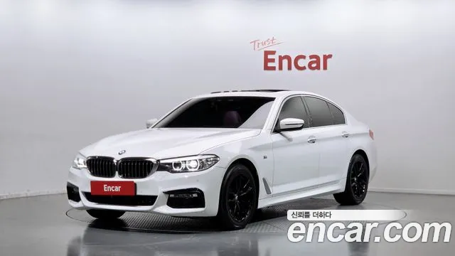 BMW 5-Series 2018 — photo 1