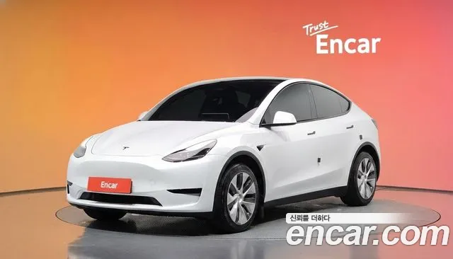 Tesla Model Y 2024 — photo 1