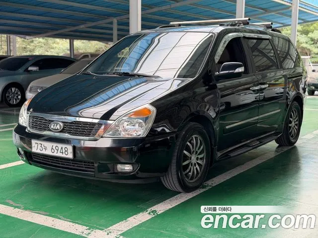 Kia Canival 2013 — photo 1