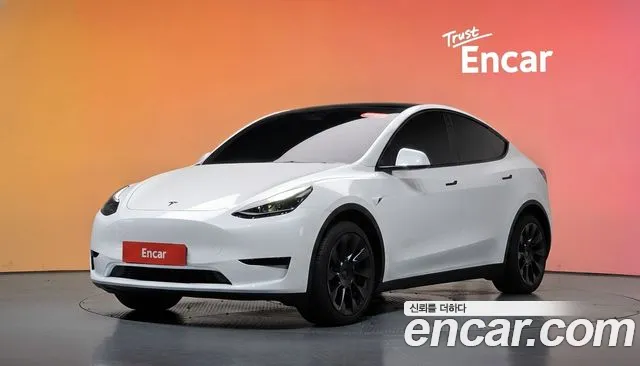 Tesla Model Y 2024 — photo 1