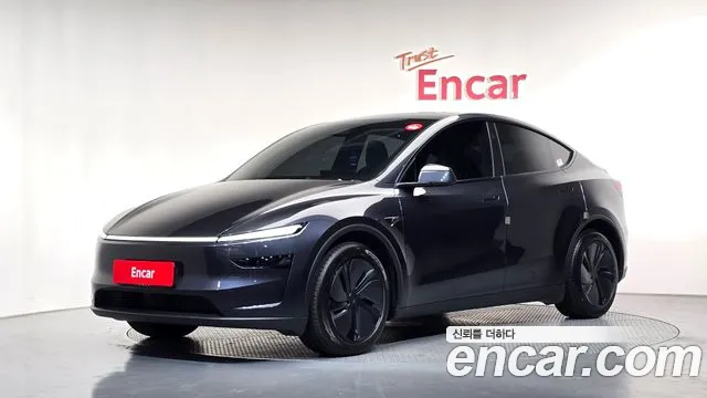Tesla Model Y 2025 — photo 1