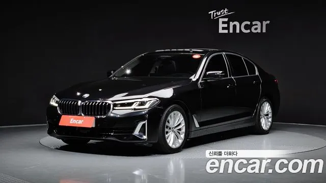 BMW 5-Series 2023 — photo 1
