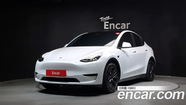 Tesla Model Y 2024 — photo 1