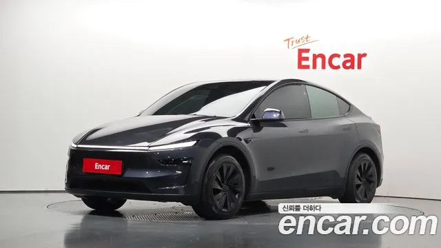 Tesla Model Y 2025 — photo 1