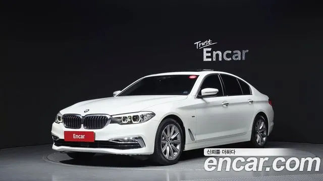 BMW 5-Series 2018 — photo 1