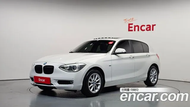 BMW 1-Series 2014 — photo 1