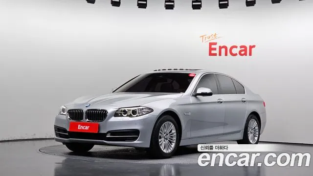 BMW 5-Series 2015 — photo 1