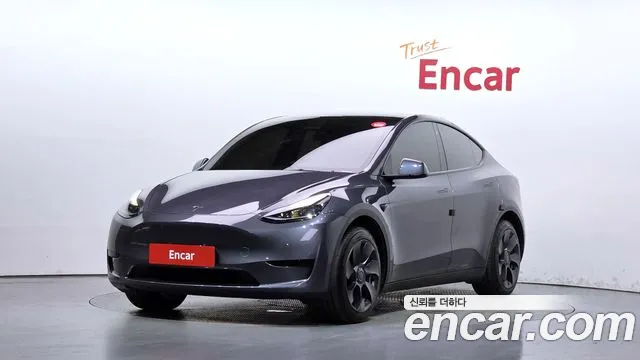 Tesla Model Y 2024 — photo 1