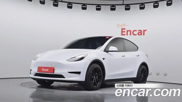 Tesla Model Y 2024 — photo 1