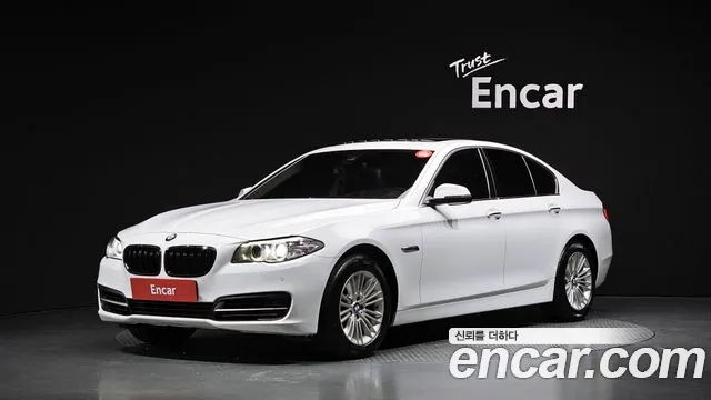BMW 5-Series 2015 — photo 1