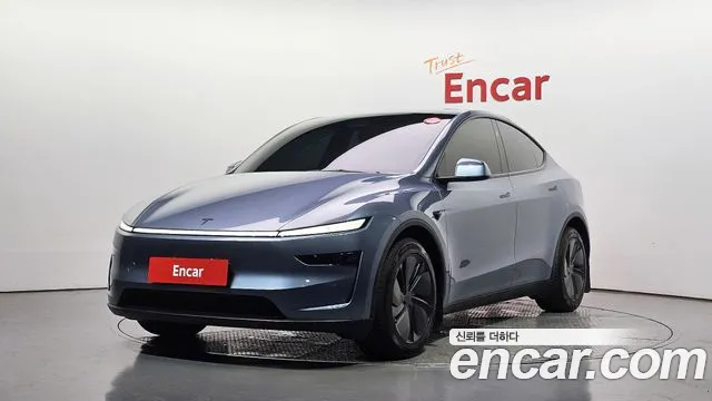 Tesla Model Y 2025 — photo 1
