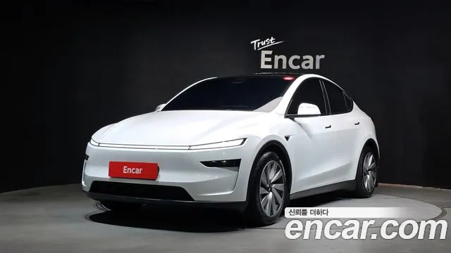 Tesla Model Y 2025 — photo 1
