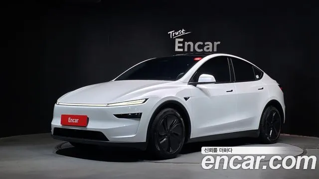 Tesla Model Y 2025 — photo 1