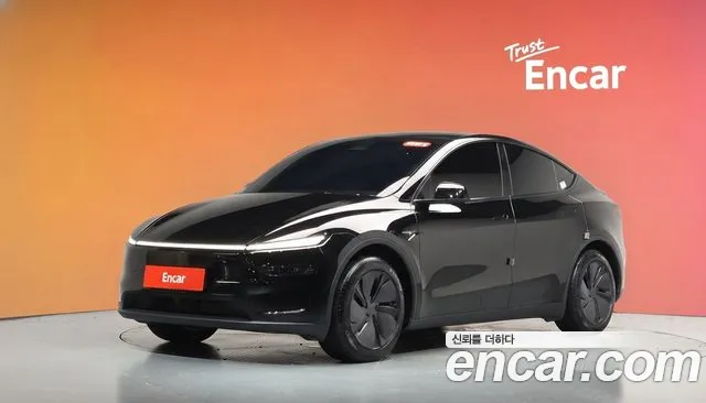 Tesla Model Y 2025 — photo 1