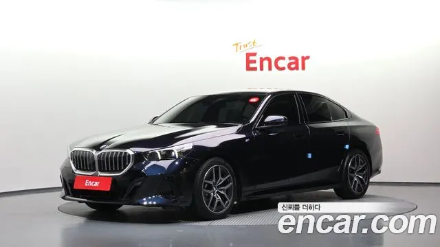 BMW 5-Series 2024 — photo 1