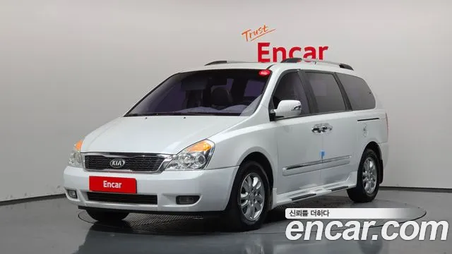 Kia Canival 2013 — photo 1