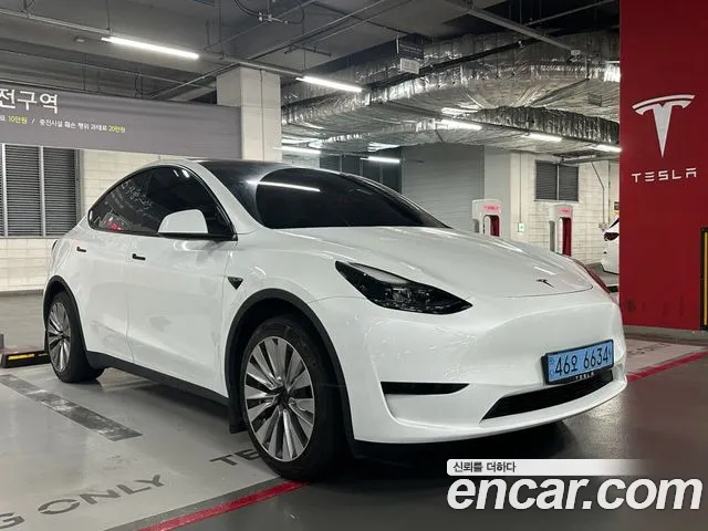 Tesla Model Y 2023 — photo 1