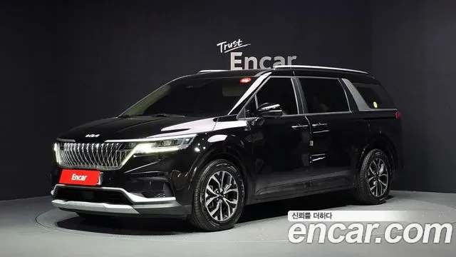 Kia Canival 2023 — photo 1