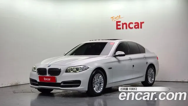 BMW 5-Series 2015 — photo 1