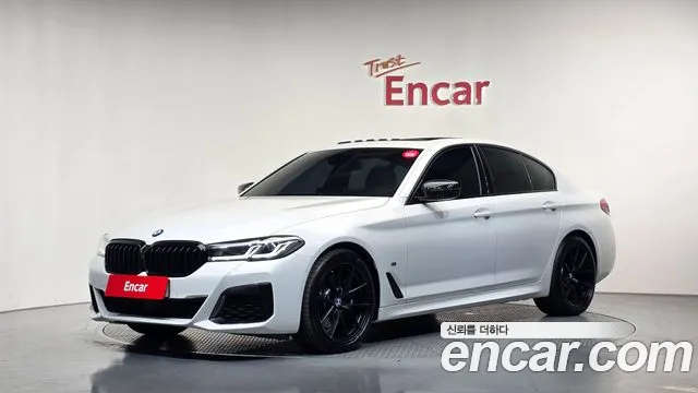 BMW 5-Series 2023 — photo 1