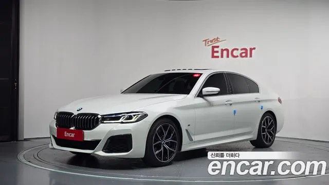 BMW 5-Series 2023 — photo 1